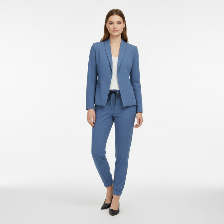Back view of women's elegant blazer and trouser set, showcasing a flattering fit, stretch fabric