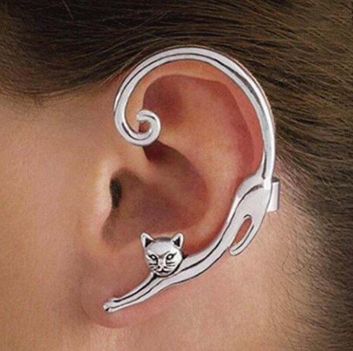 Elegant women's cat dangle earrings, chic animal jewelry. Available in silver, gold, or black, a perfect gift for her.