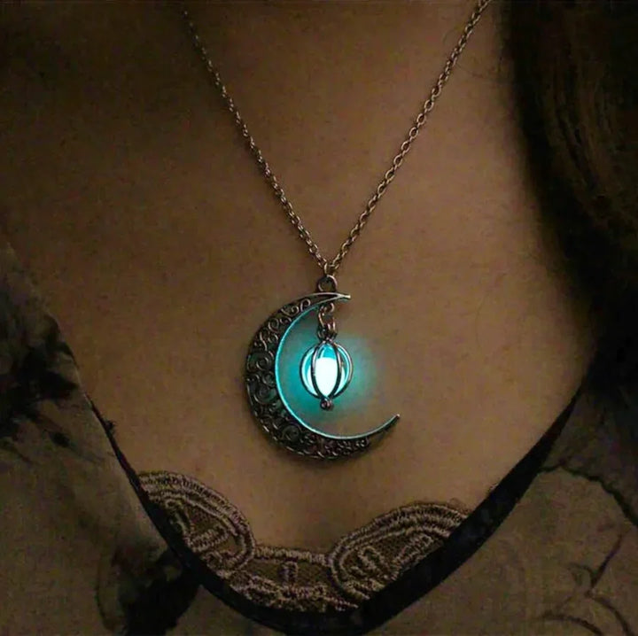 Elegant women's celestial moonstone pendant necklace with a shimmering silver chain, perfect for any occasion.