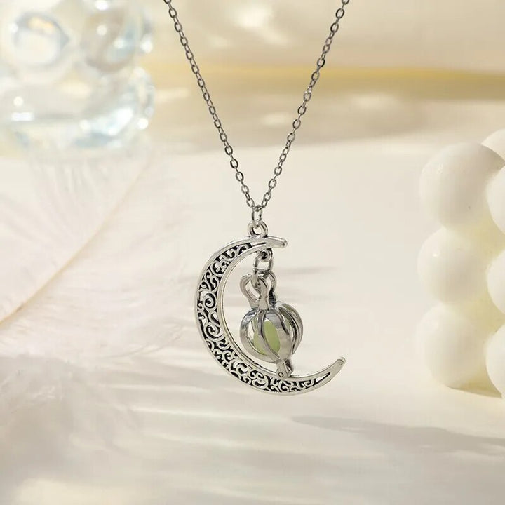 Stunning silver and white moonstone pendant necklace, a women's gemstone jewelry piece with a unique celestial design.