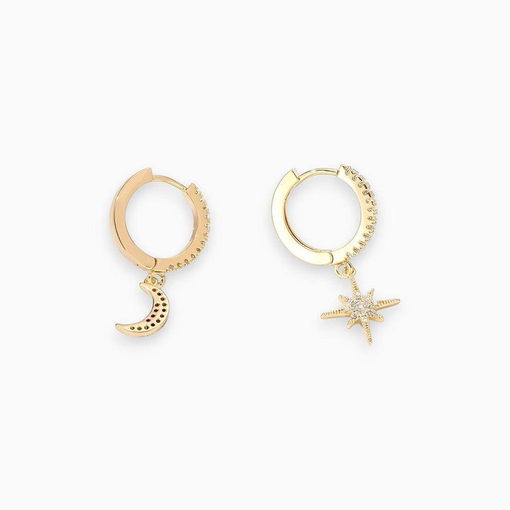 Elegant women's celestial sparkle drop earrings with a starry sky design, available in gold or silver. Fashion jewelry.
