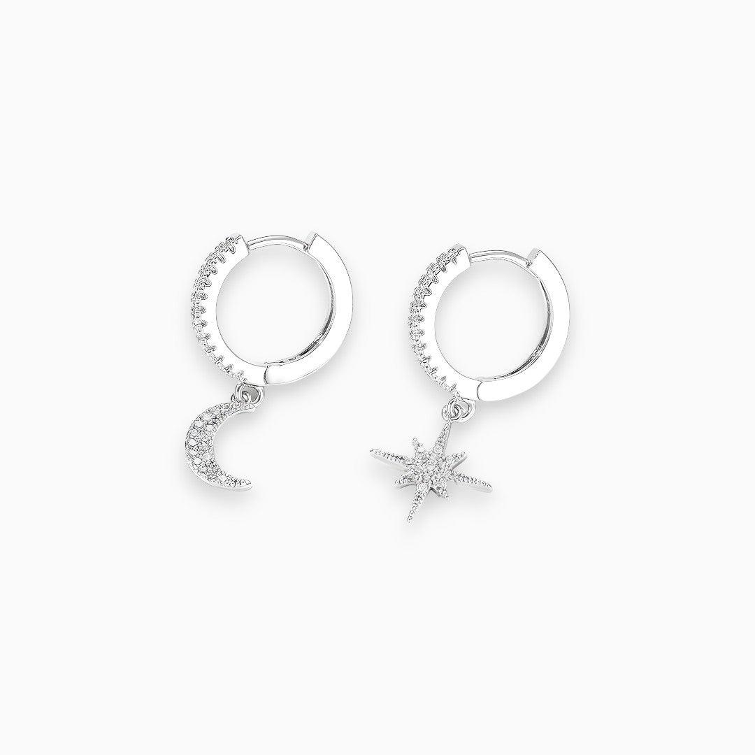 Women's shimmering celestial drop earrings, featuring sparkling crystals & a unique starry design. Elegant fashion jewelry gift.