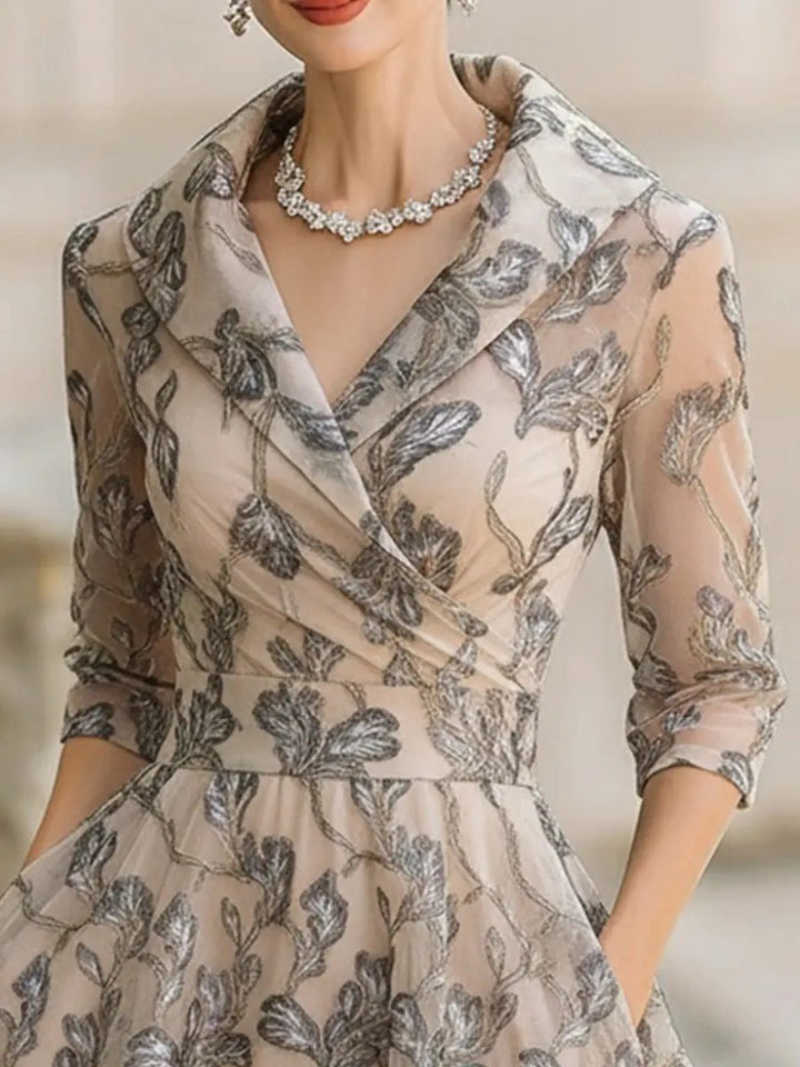 Women's A-line wrap midi dress in champagne with short sleeves and delicate leaf embroidery, feminine style.