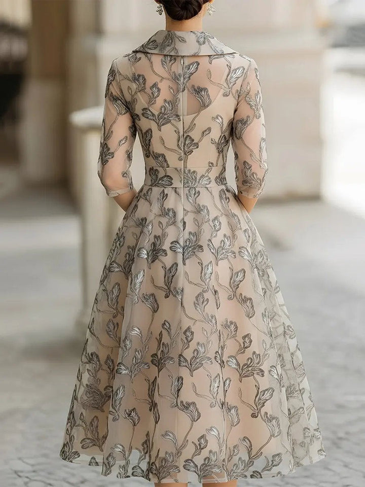 Champagne elegant short sleeve midi dress for women. Features delicate leaf embroidery. Timeless and graceful.