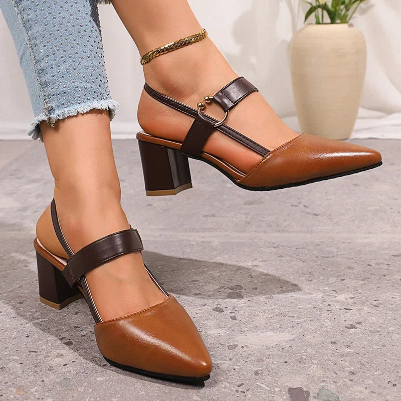 Brown women's elegant ring heels, chic block heel design for versatile day or evening fashion. Slip-on style.