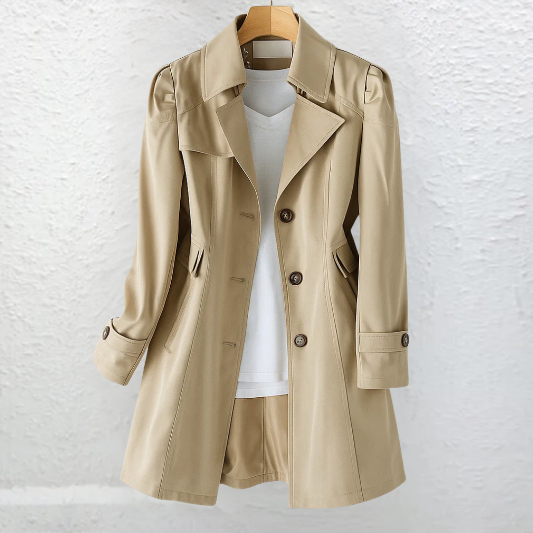 Stylish women's structured trench coat, elegantly tailored for a polished workwear or classic everyday look.