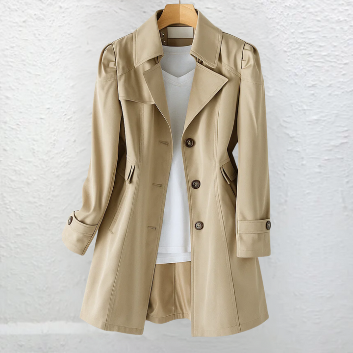 Stylish women's structured trench coat, elegantly tailored for a polished workwear or classic everyday look.
