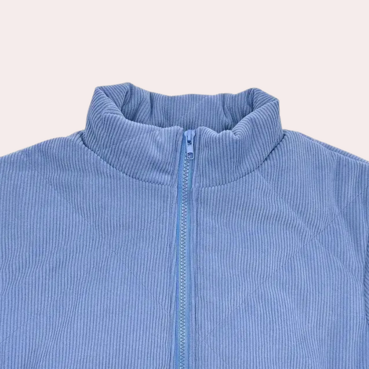 Warm blue women's winter coat with a classic design. Perfect long sleeve outerwear for elegant cold weather.