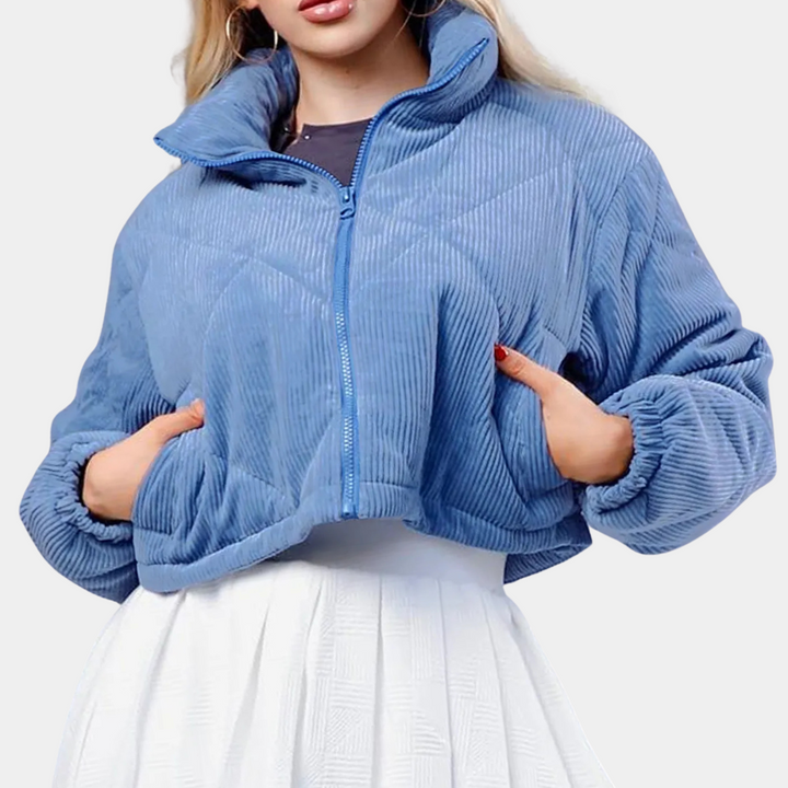Classic blue women's winter coat, a warm long-sleeve jacket ideal for elegant cold weather fashion.