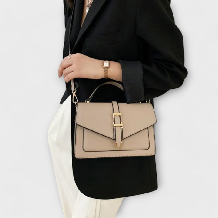 Black leather classic flap shoulder bag for women, an elegant and versatile handbag.