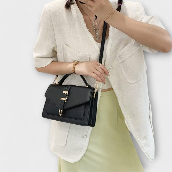 Chic women's flap shoulder bag with a classic design, an elegant handbag.