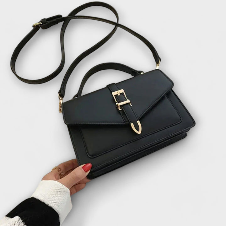 Women's elegant flap shoulder bag, a classic handbag for versatile styling.