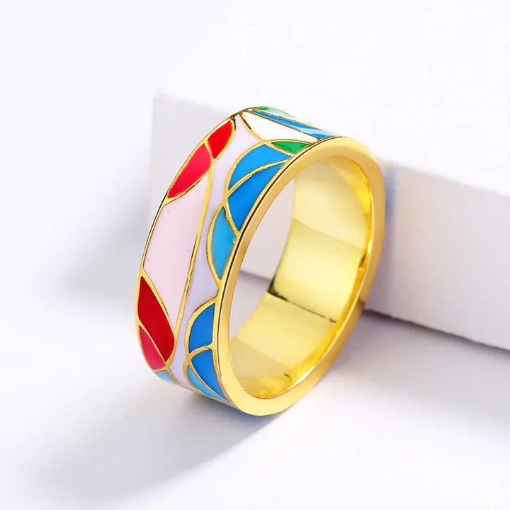 Gold plated women's classic enamel ring with a shimmering zirconia stone, elegant and timeless.