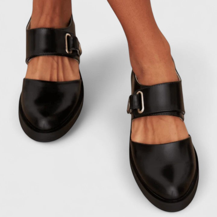 Chic retro women's low heel pumps with a buckle strap, versatile for both formal and casual elegant occasions.
