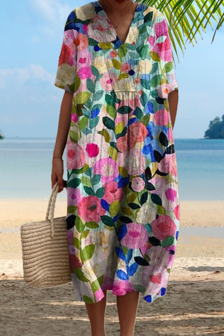 Elegant women's classic midi dress in soft pink, perfect for comfortable everyday wear or versatile spring fashion.