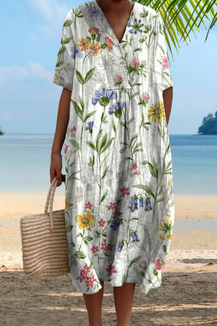 Versatile women's comfortable midi dress in crisp white, an elegant choice for casual spring or summer fashion.