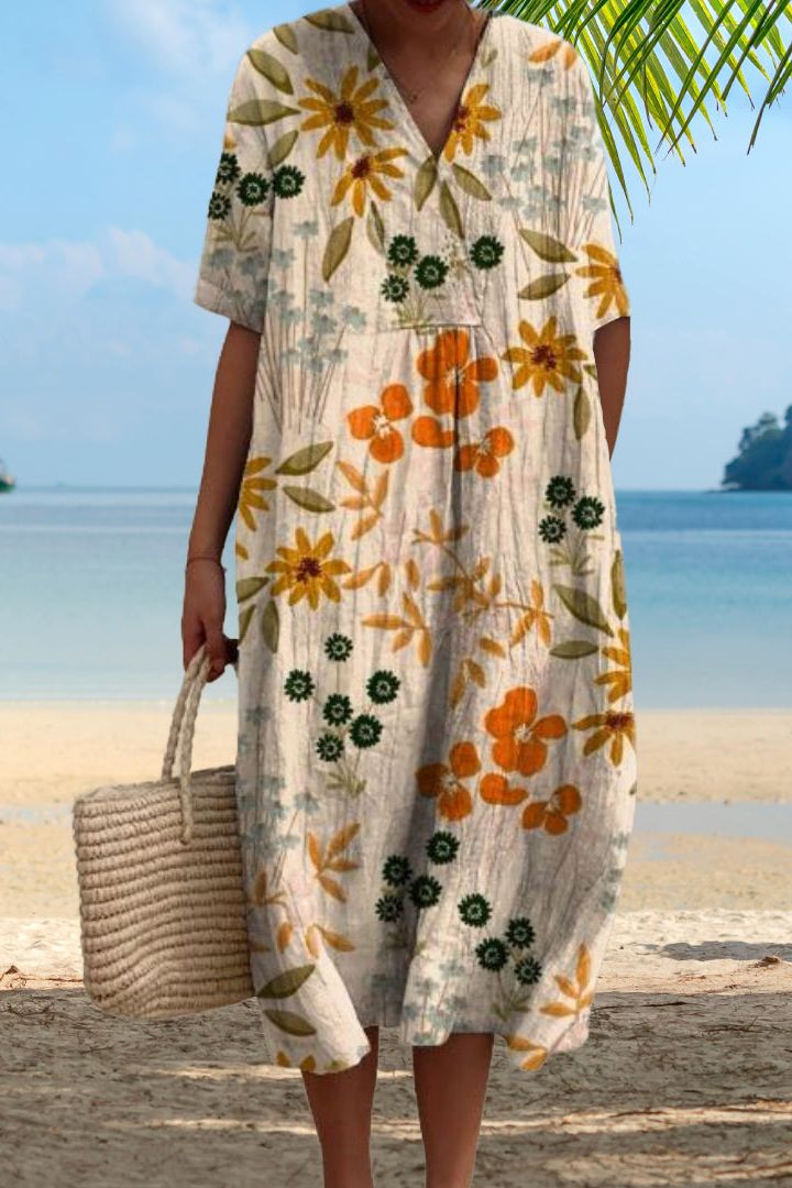 Stylish women's beige midi dress, a comfortable and classic choice for elegant everyday wear or versatile occasions.