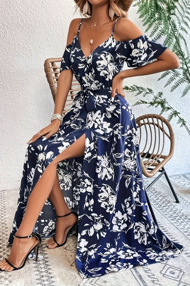 Elegant women's cold shoulder maxi dress for evening wear. Flowing, romantic style, perfect for formal occasions.