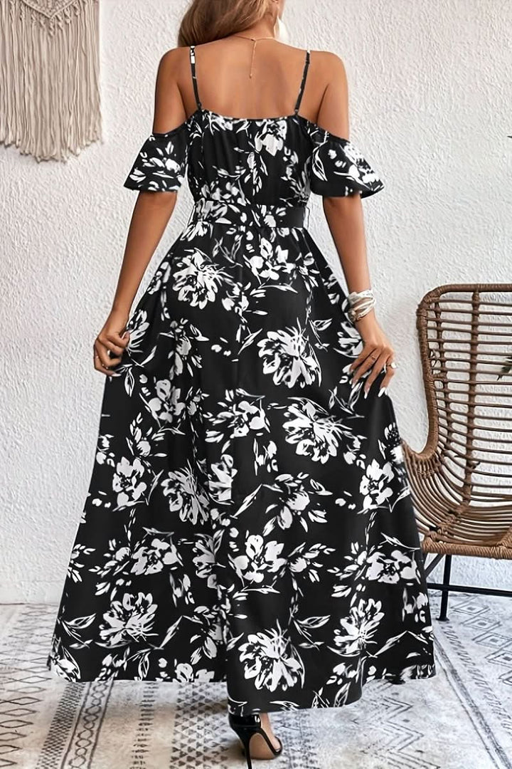Full length women's elegant cold shoulder maxi dress. Romantic flowing fabric, suitable for formal events.