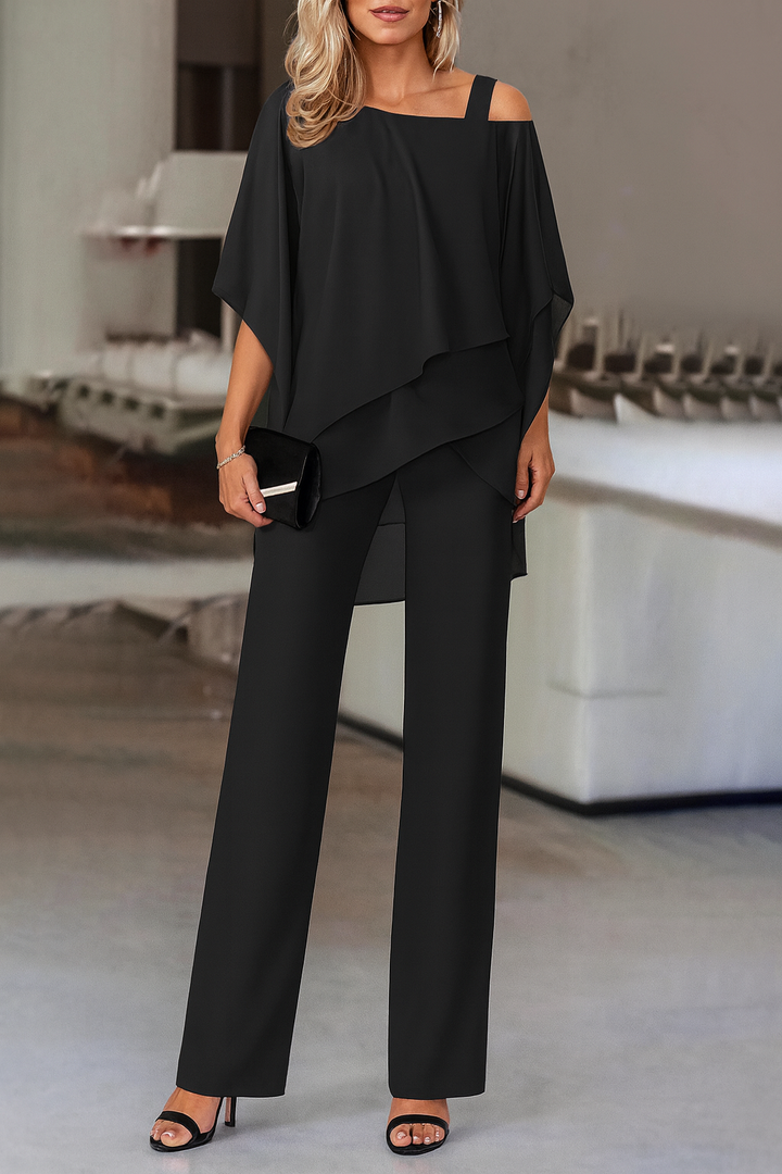 Chic women's two-piece pants set with cold-shoulder top. Ideal for elegant party and vacation wear.