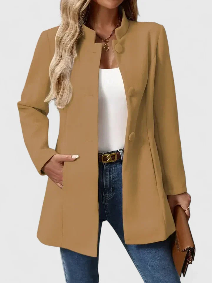 Elegant women's collarless jacket in a versatile style, perfect for sophisticated office or chic casual wear.