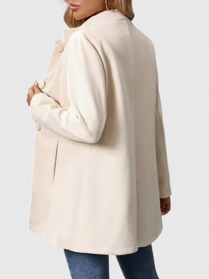 Black women's collarless jacket, offering a chic and versatile style for both office and casual occasions.