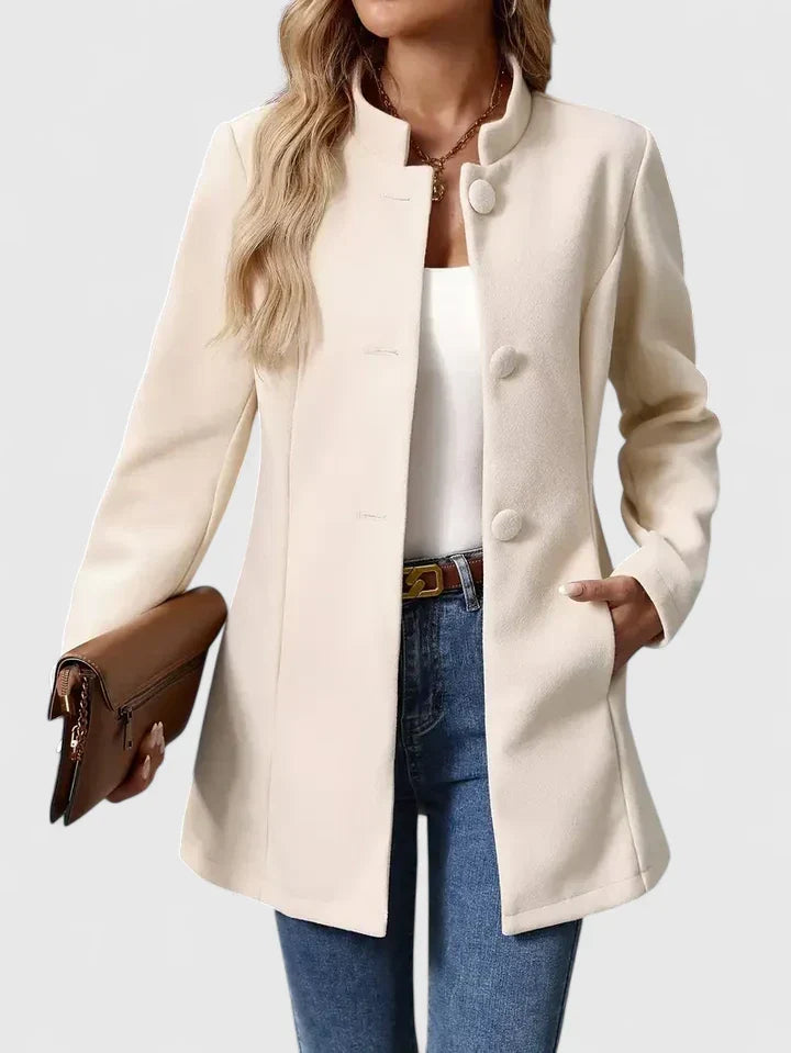 Sophisticated women's collarless jacket for office wear, an elegant and versatile mid-thigh length design.