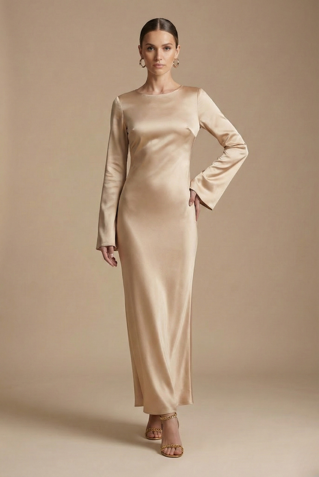 Beautiful women's wedding guest maxi dress. Elegant column style with sophisticated flare sleeves.