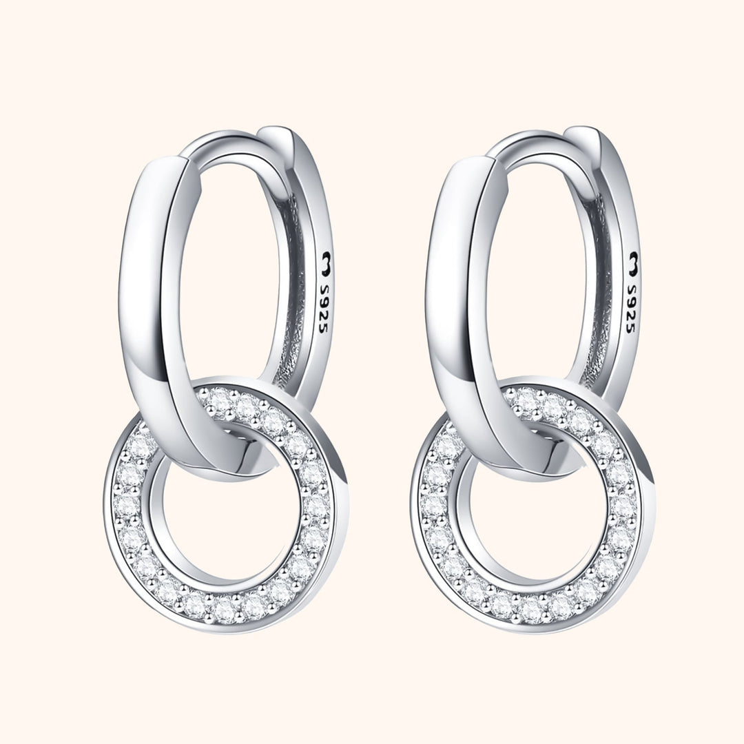 Elegant women's connected hoop earrings, silver & gold plated, perfect minimalist fashion accessory.