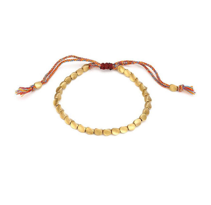 Lucky copper bead bracelet for women. Adjustable elegant jewelry with positive energy charm.