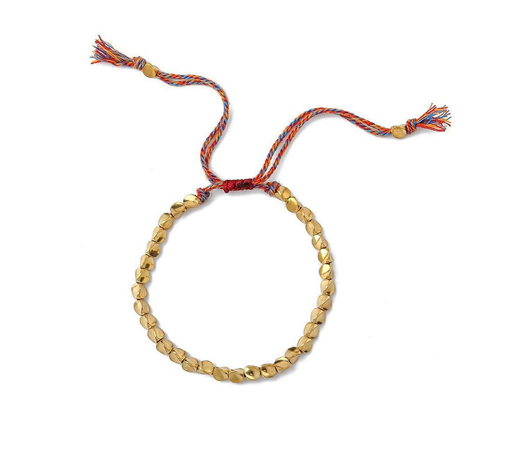 Stylish copper beaded bracelet, an elegant gift for her. Fashion accessory with a lucky charm.