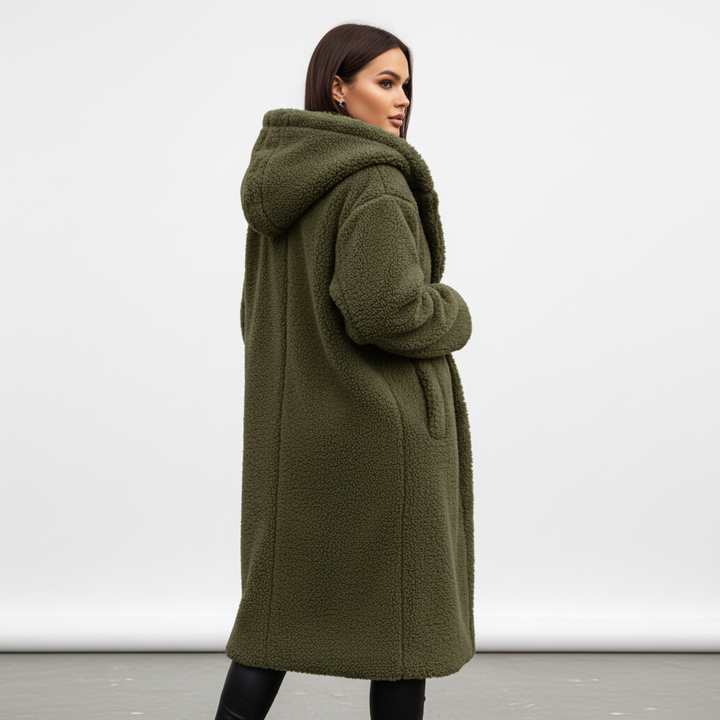 Women's versatile polyester blend longline coat, a must-have hooded jacket for autumn and winter warmth.