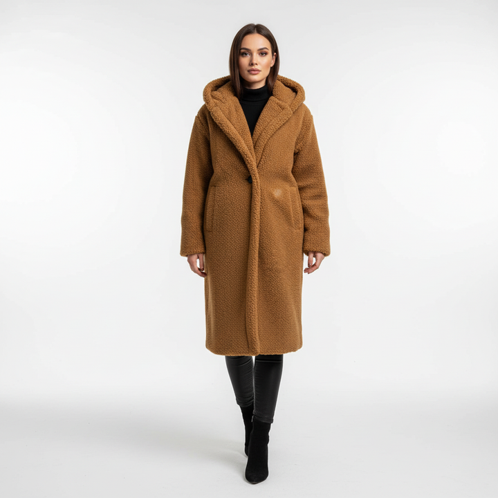 Back view of the women's warm longline hooded coat, highlighting its sophisticated and versatile fashion.