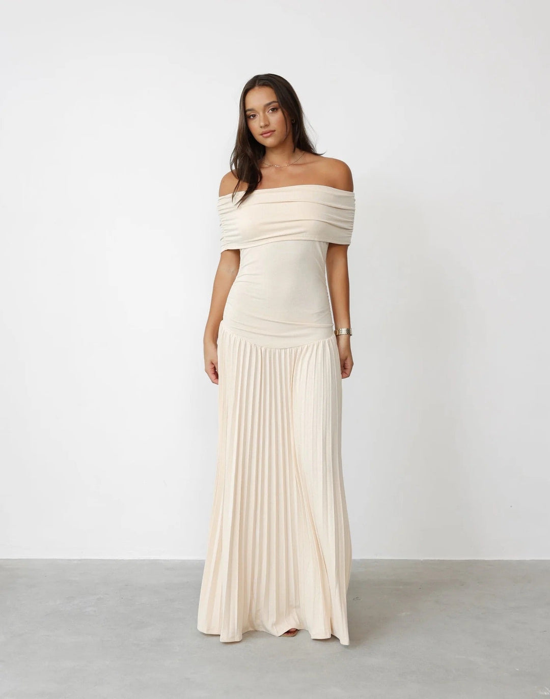 Elegant Women's Cream Off-Shoulder Pleated Maxi Wedding Guest Dress.