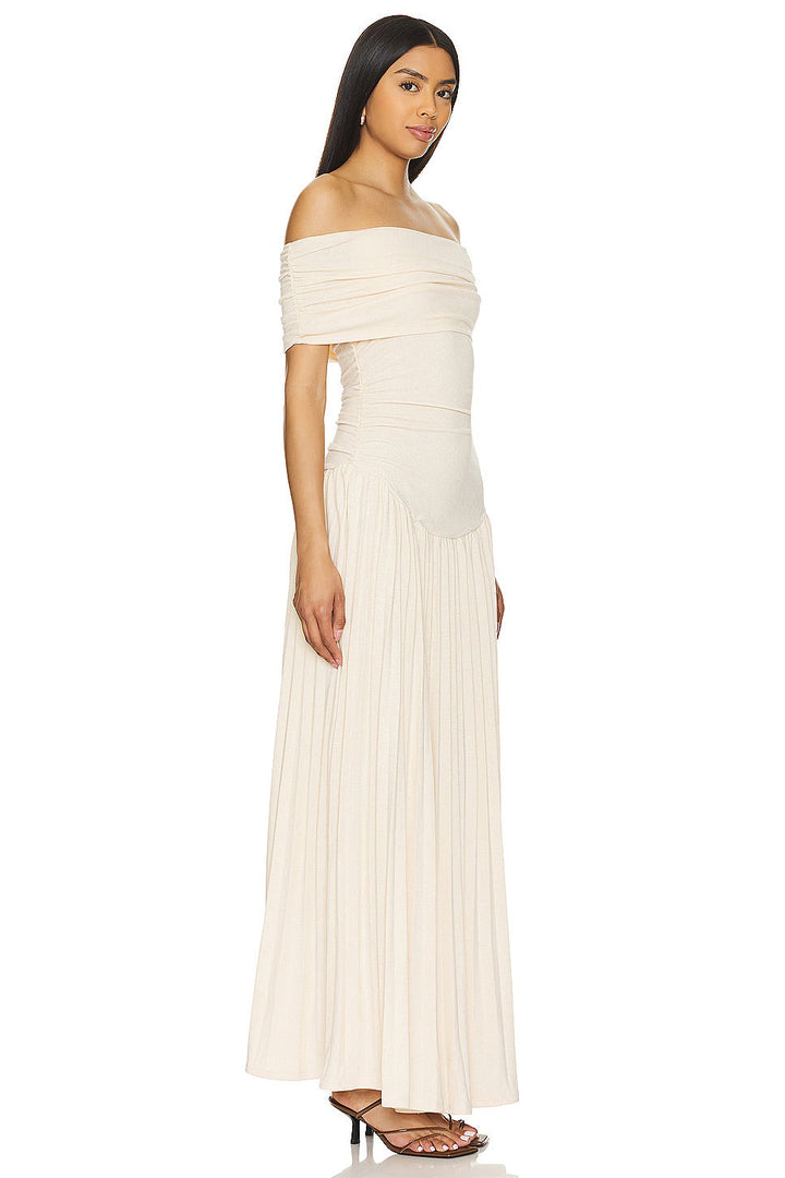 Beautiful Cream Off-Shoulder Pleated Maxi Dress, an ideal wedding guest outfit.