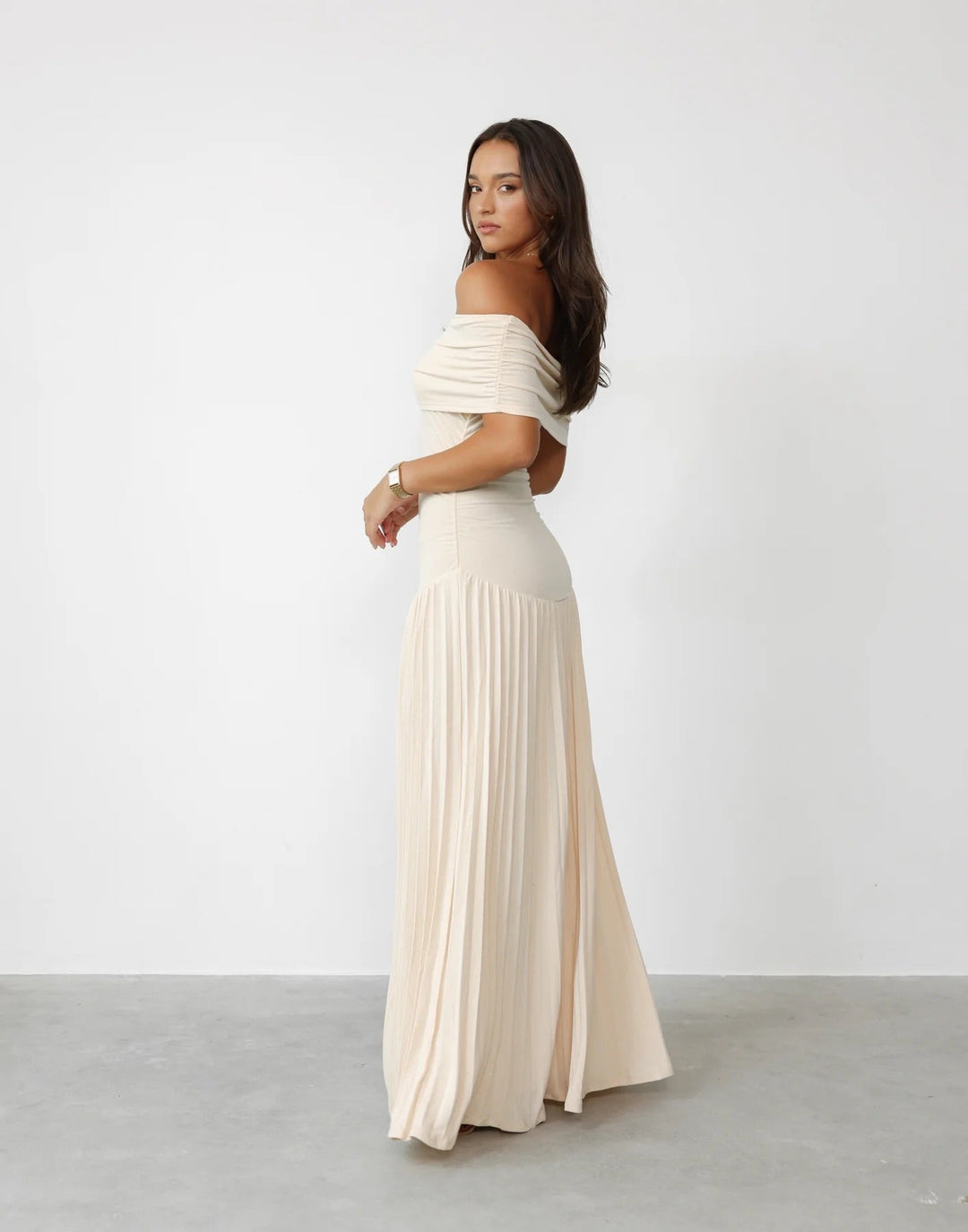 Beautiful Women's Off-Shoulder Maxi Dress with elegant pleats, perfect for evening.