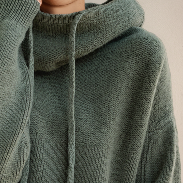 Cozy cream knit roll-neck jumper for women, a stylish and warm winter essential.