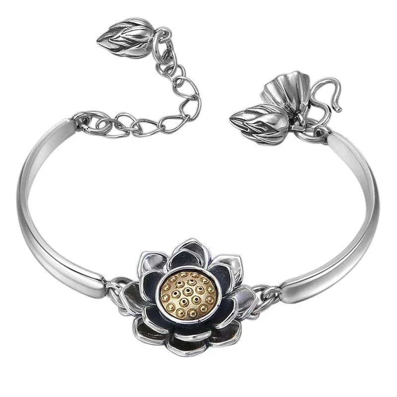 Elegant women's creative lotus bracelet in silver tone stainless steel, adjustable for a perfect fit, spiritual jewelry gift.