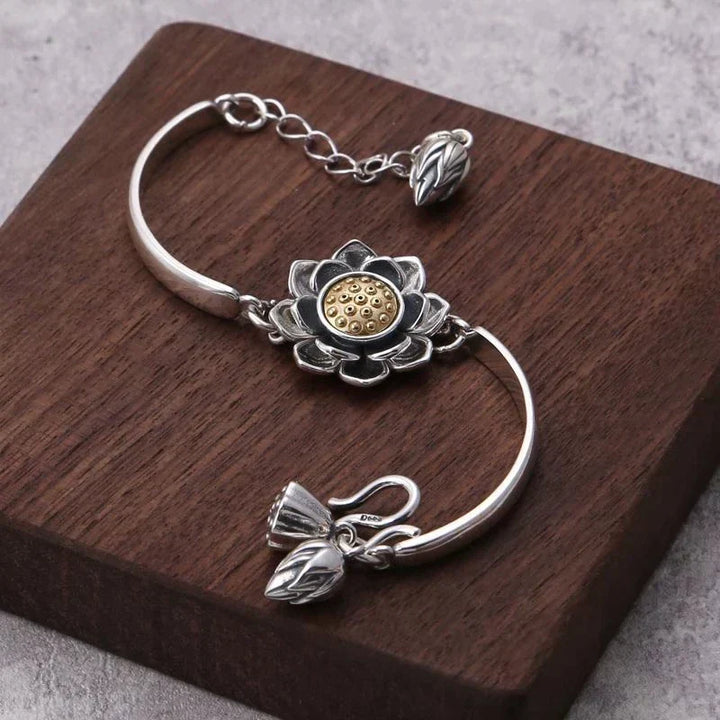 Silver tone stainless steel women's lotus bracelet. Elegant, adjustable, and creative, perfect spiritual jewelry for women.