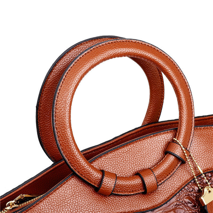 Textured croc embossed women's handbag, a chic shoulder bag in a luxurious vintage style.