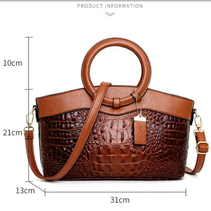 Fashion-forward women's croc embossed handbag, a luxury shoulder bag for versatile daily style.