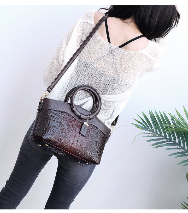 Luxury women's croc embossed shoulder bag, a versatile daily handbag with elegant vintage design.