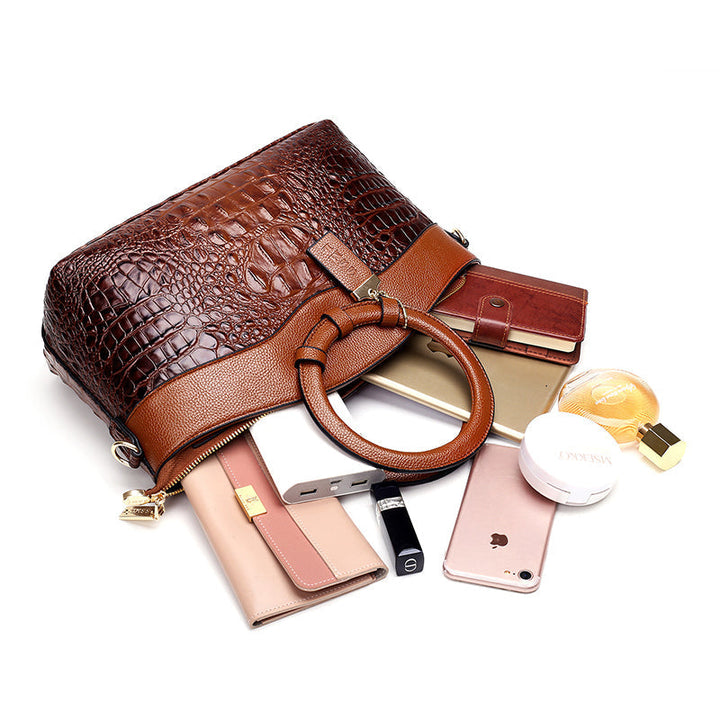 Luxury croc embossed handbag for women, a stylish shoulder bag with vintage flair for any outfit.