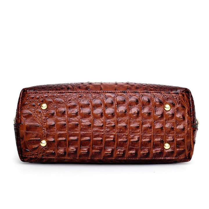 Vintage style croc embossed handbag, an elegant women's shoulder bag for daily luxury.