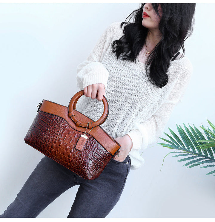 Women's elegant croc embossed daily bag, a versatile luxury shoulder bag & fashion accessory.