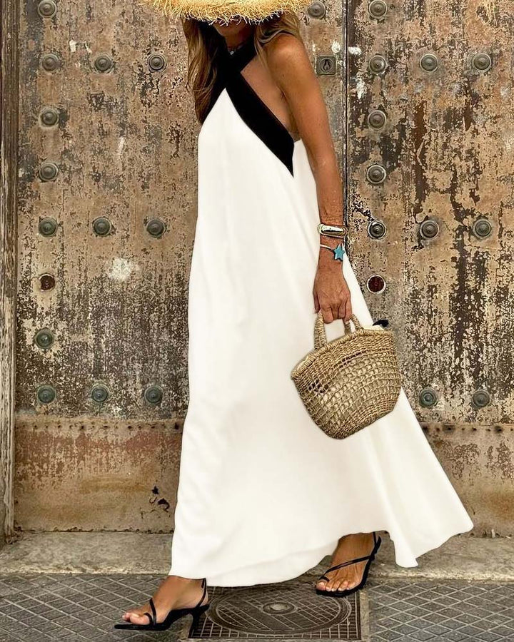 Chic women's A-line cross-neck vacation dress, perfect for summer getaways and casual wear.