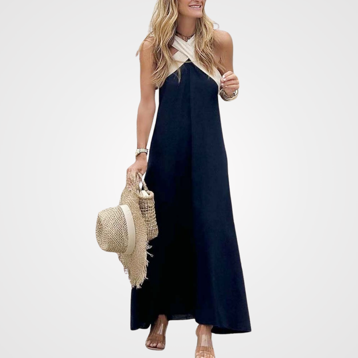 Chic A-line cross-neck sleeveless dress, offering a flowy and comfortable fit for summer.