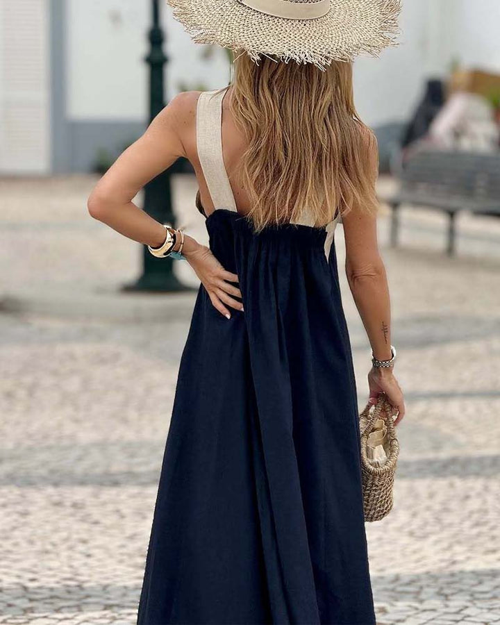 Flattering A-line cross-neck summer dress for women, providing a flowy silhouette.