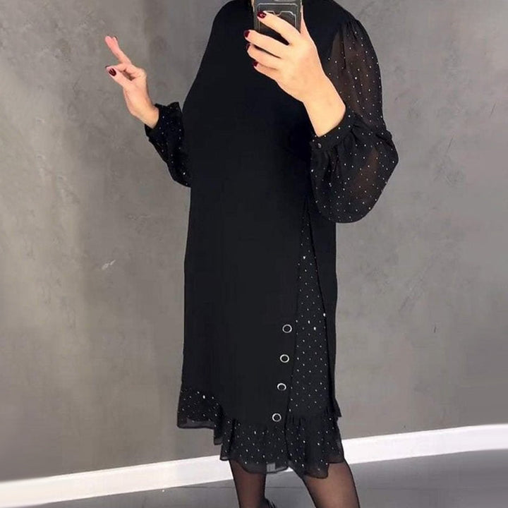 Embellished women's round neck dress with shimmering crystals, a chic choice for any party or occasion.