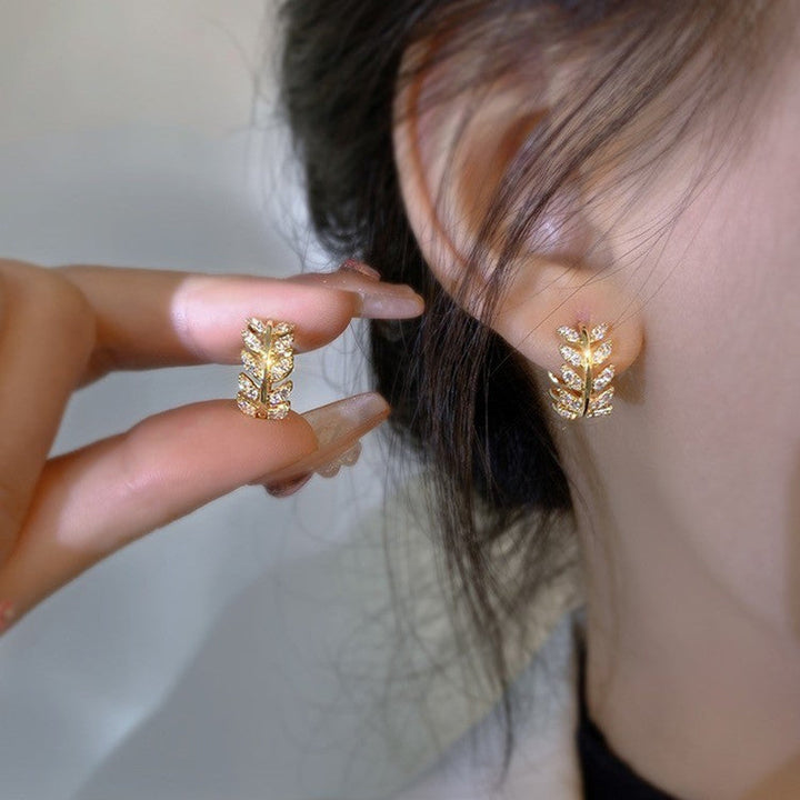 Classic women's diamond stud earrings, timeless elegant design, perfect sparkling fine jewelry.